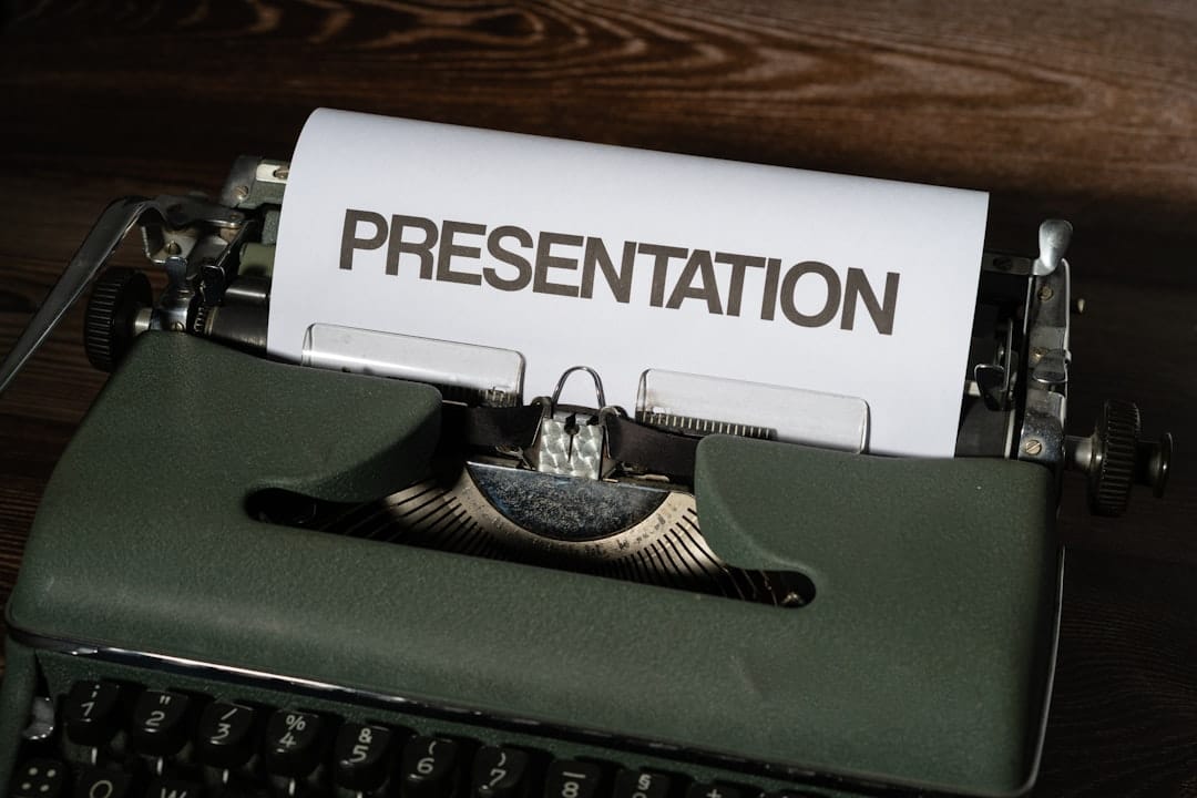 A typewriter with a sign on it