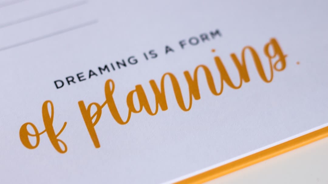 A close up of a piece of paper with writing on it